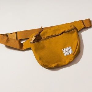 Fanny pack, mustard color. Very lightweight. The cutest fashion accessory.